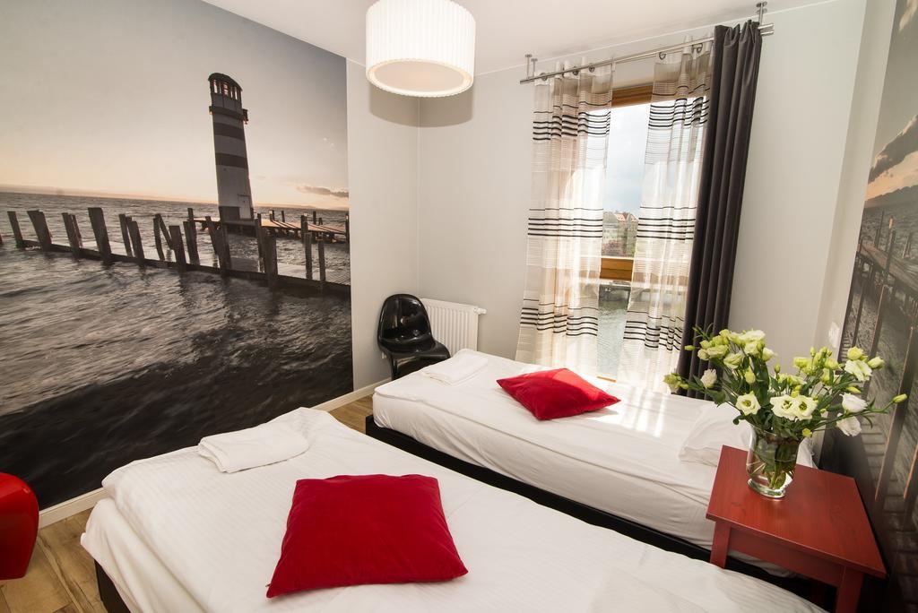 Апартаменти Staywin Riverfront Lofts